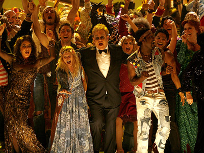 Elton John With The Cast Of Hair.  Photo: Landov Via EW.com