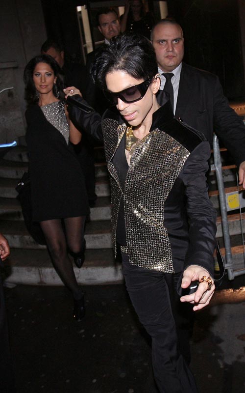 Prince Attends Yves Saint Laurent Fashion Show. Photo: Flynetonline.com